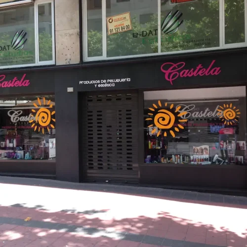 Vinilos para escaparates de local de productos de peluquería